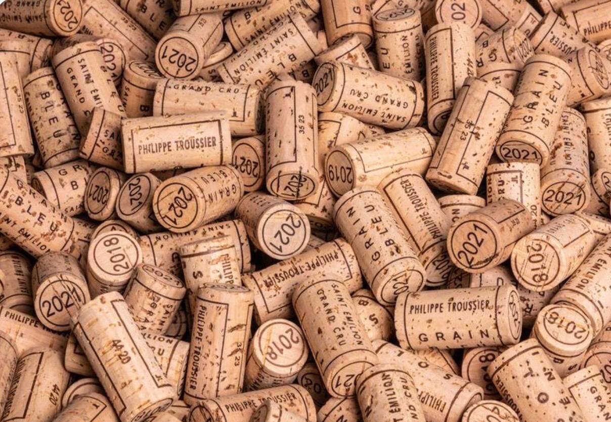 Corks printed with the estate name